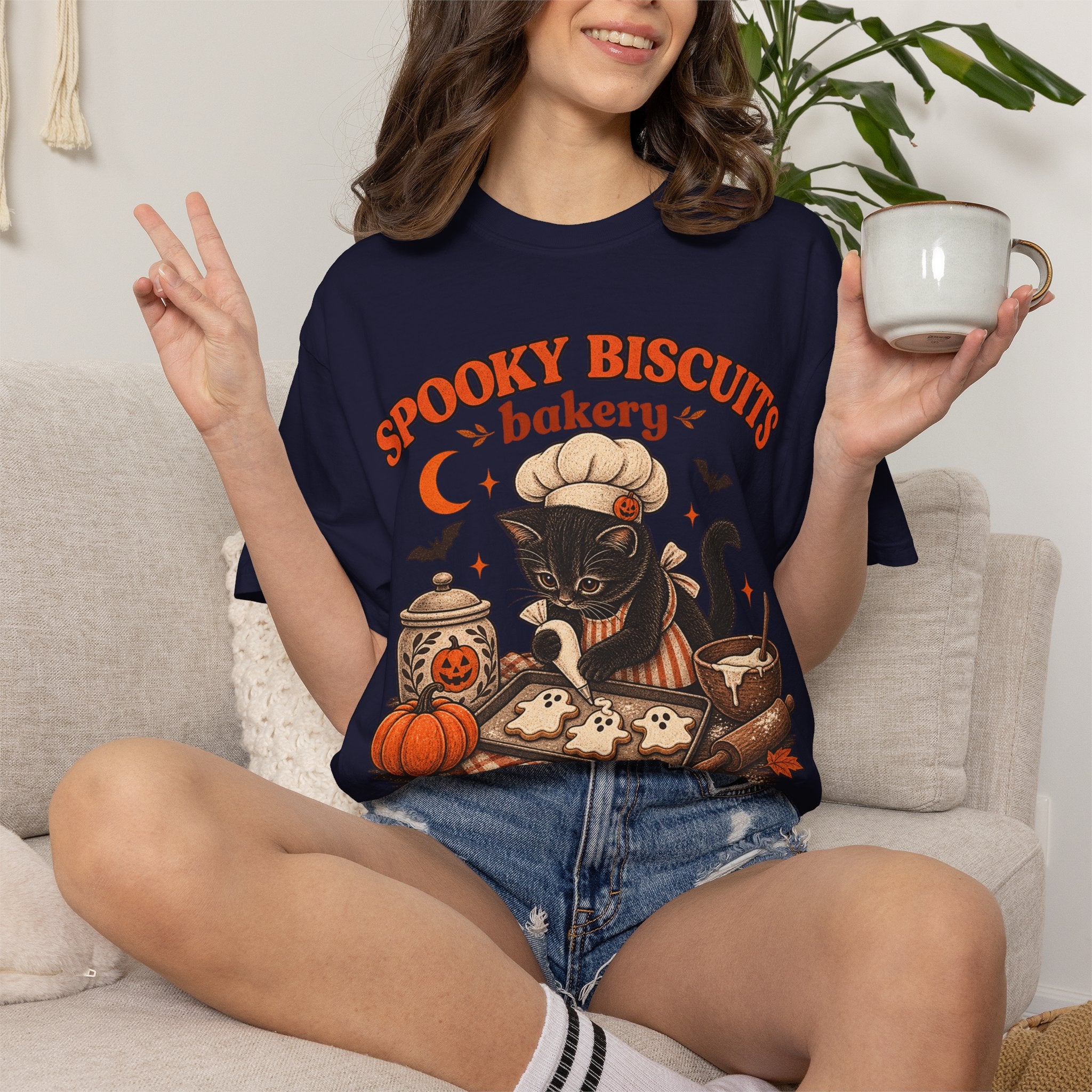 Spooky Biscuits Bakery T-Shirt — Halloween Black Cat Baking Tee (“We Knead ’Em, You Need ’Em”)